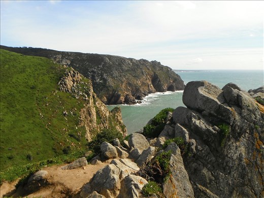 Bracing against the fierce wind of the Cabo da Roca, experience the edge of the world.