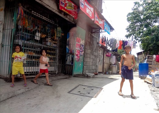 Children are everywhere in the streets here.  All of them are full of life, inquisitive, and curious of my white face.