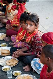 Girl waiting for authorization to eat. Kumbh Mela celebrations in Haridwar.: by powerofsilence, Views[575]