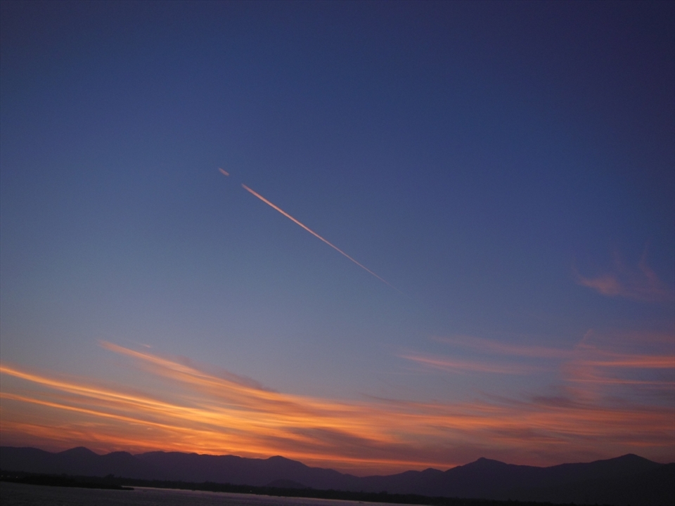Our life always revolves around the rising and the setting sun. This natural phenomenon is most important for our survival. Every day begins with a new hope and every sunset creates new history. The flying jet and the pilot in this photograph resemble as if they are saluting the rising sun.