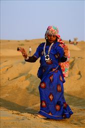 Tribal girl dancing and entertaining people to earn money at Sam Sand Dunes: by prashant30, Views[415]