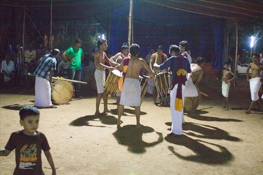 Drummers seeking the perfect rhythm:
Music is an integral part of Theyyam as it upholds the spirit of the entire event.