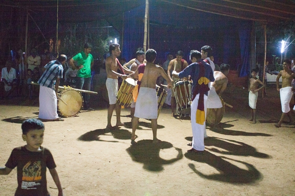 Drummers seeking the perfect rhythm:
Music is an integral part of Theyyam as it upholds the spirit of the entire event.