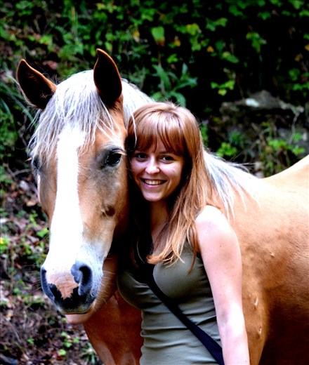 You can see me and my new friend on this picture. I met him in the wood 10 seconds before my dad took this photo but it looks like we know each other very well! The animals use their hearts, not words 
