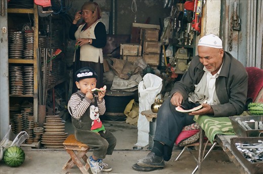 A peek into the life of a typical Uyghur family, in Xinjiang, Western China. It appears that bonding over a freshly sliced melon is an integral part of their culture. There is this great sense of intimacy that radiates from them, when you see them relishing the sweetness, in both the fruit as well as the kinship.
