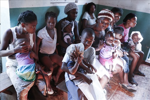 Patients wait in Madame Bwa's Malnutrition Clinic, Cap Haitian's poorest slum.