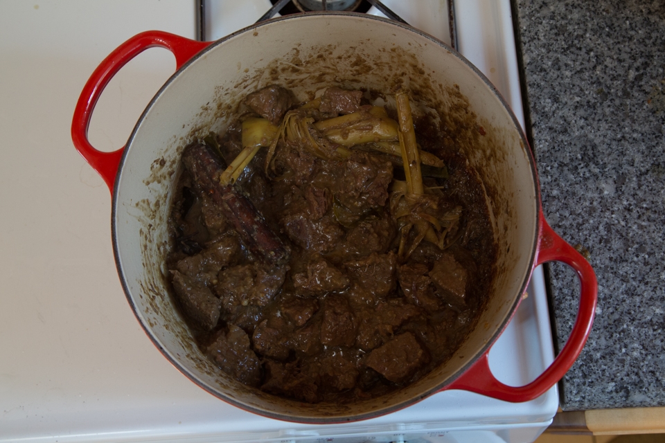 After cooking for two and a half hours, Beef Rendang gains a rich, brown color.
