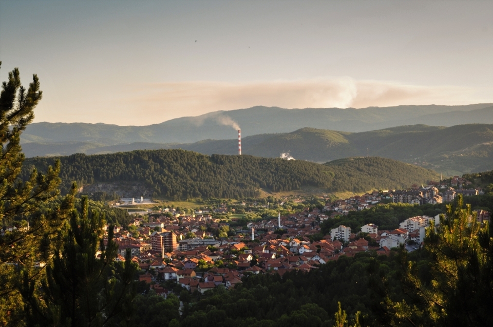The last remaining industrial town in Montenegro, Pljevlja, as seen from one of the surrounding hills. Behind another hill, the flue-gas stack of the thermal coal plant can be seen. The hill is but a minor nuisance as far as the gas is concerned. Montenegro relies on Pljevlja as the country's main economic engine, but in an industry which demands exploitation of the town and robs the residents their well-being and the ability to decide their own future. Pljevlja has intense potential for a promising future with its geographic position and exceptional natural resources, but will that future will be smothered by the fumes of a country which relies on its toxic exploitation? 