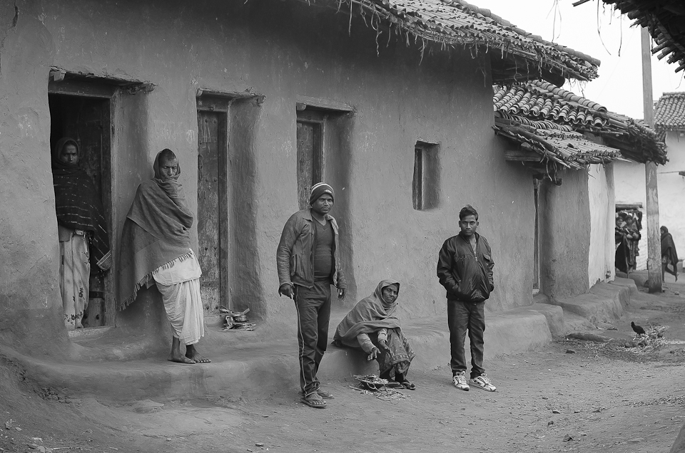 Old Ram Kumar with his family and his sons. Both his sons work in the nearby town of Daltonganj, one as a daily labourer and the other as a peon. It is a daily fight to earn their livelihood.