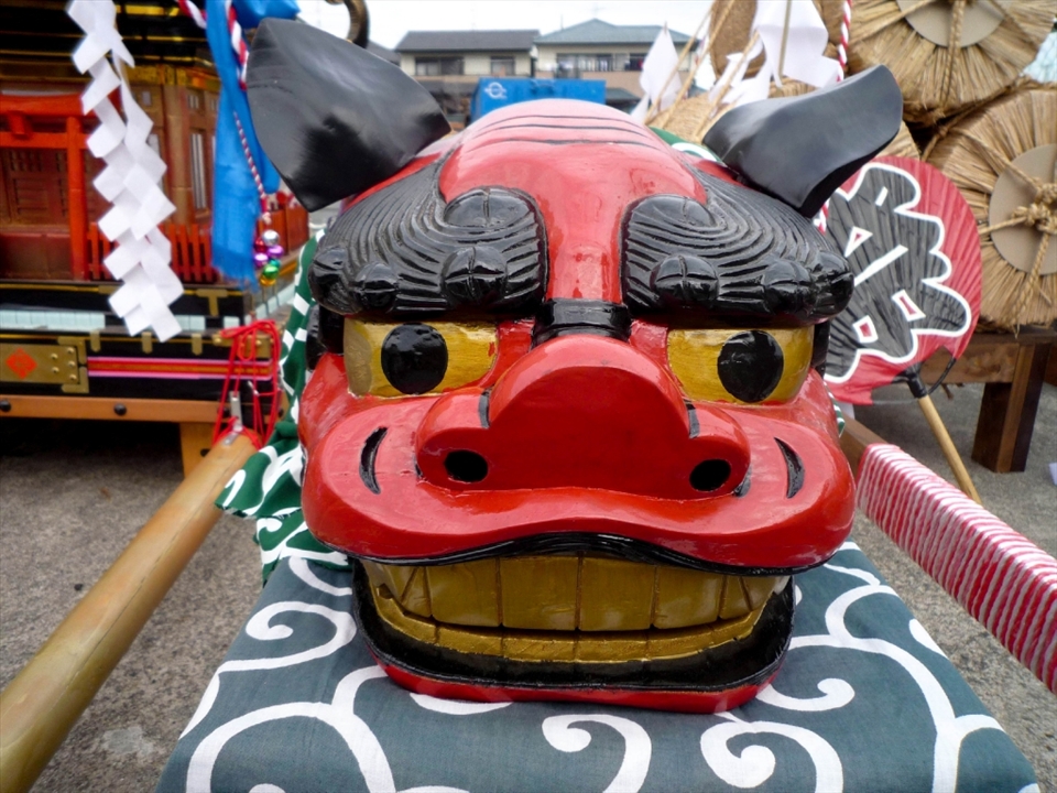 A fearsome-looking mask used in the parade celebrating the harvest and offering thanks. Such frightening visages are abundant in Japan, often having the positive connotation of warding off evil or ill fortune.