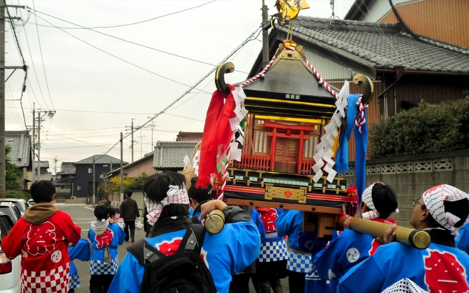 A portable shrine is hauled through the streets to raucous shouting and music, destined for a site enshrining the agricultural deity. This ritual link to old Japan now rather incongruously shares street space with cars and telephone poles, but that doesn't dampen the local spirit one bit.