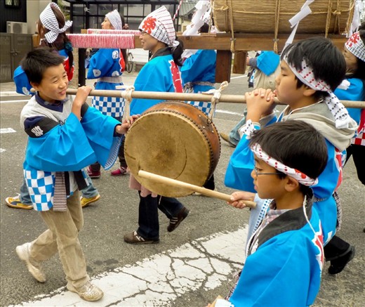 The whole community plays a role and kids enjoy dressing up and making noise to herald the arrival of the procession as it meanders through the village.