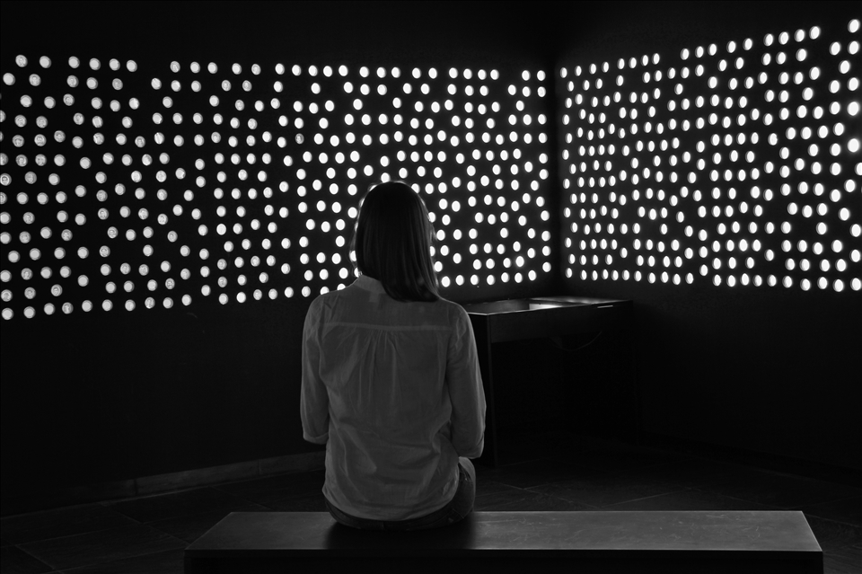 Illuminated circles represent the identified  victims of the massacre and there you can see photos, names and messages of victims before the massacre. The dark circles represent the unidentified victims. 