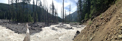 The bottom of the mountain was a disaster area. Runoff from the melting of the snow packs all formed a large river that devastates all in it's path. Getting here took avoiding flash flood warnings and falling rock signs clearly posted next to building sized boulders.