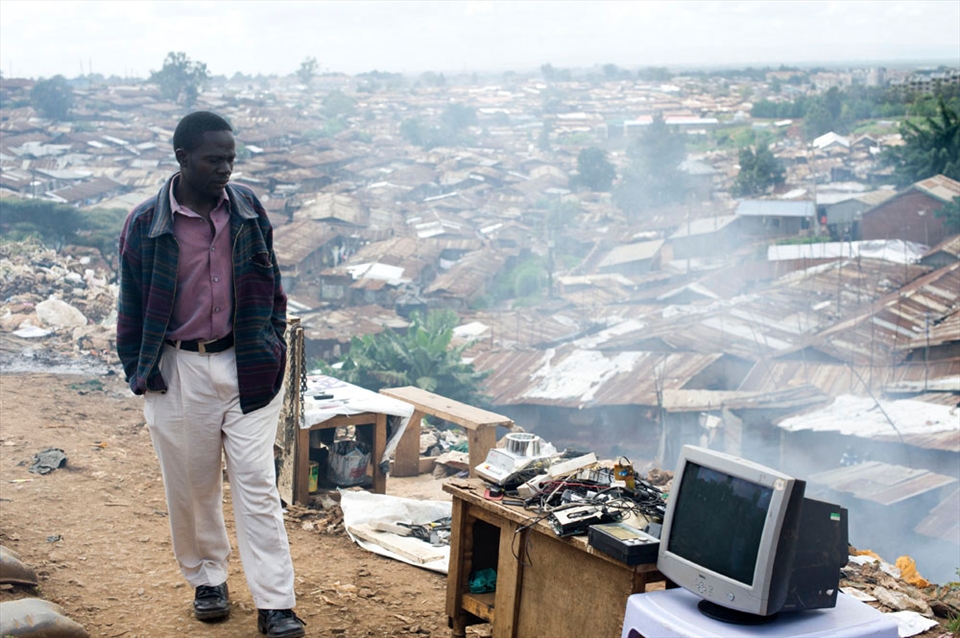 man is selling second-hand electronics