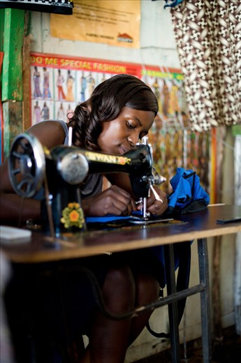 seamstress at work in her shop
