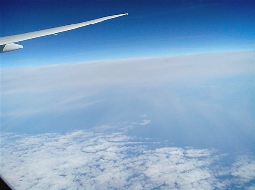 A high layer of brown smog? cloud? Over Europe