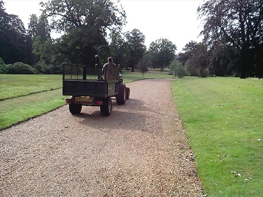 One of the gardeners, and another tractor! We can't get away from them!