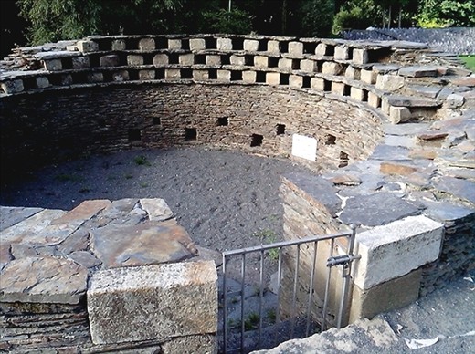 At the Abbey Don't know what it is but sign says don't walk on the wall.