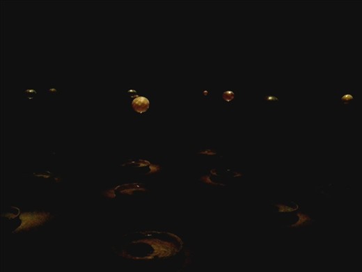 What we found there. Some sort of art display. Water dripping down over some illuminated balls into round trays!