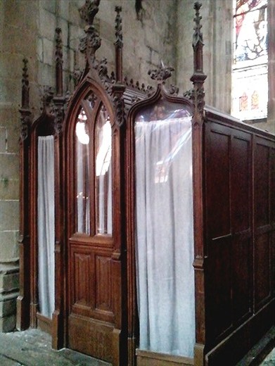 Confessional in Dinan church.  Not being Catholic I've never used one. This one, in fact the entire church, could do with a dust 