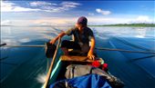 Island Bound: Villages scattered along palm fringed beaches, the only way home is via outrigger canoe. At age 14  Farja Man has an enormous responsibility of transporting weekly essentials to his village.: by rachelrobertson, Views[872]