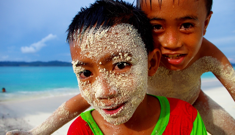 The teacher hasn’t turned up. Again. Leifu and Suratan take advantage of the crisp white sands and the freedom of the sea.