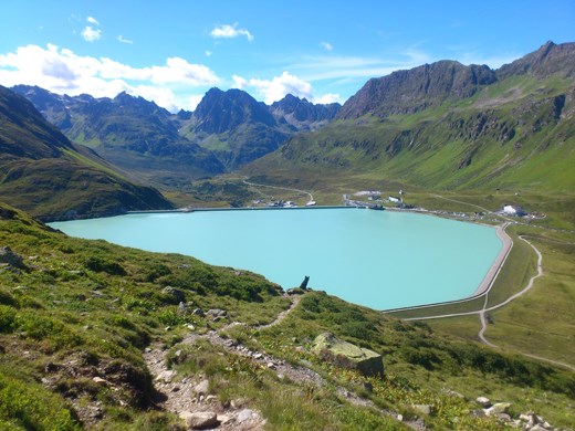 Hilda taking in the view to the Silvrettasee reservoir at the top of the Silvretta Pass