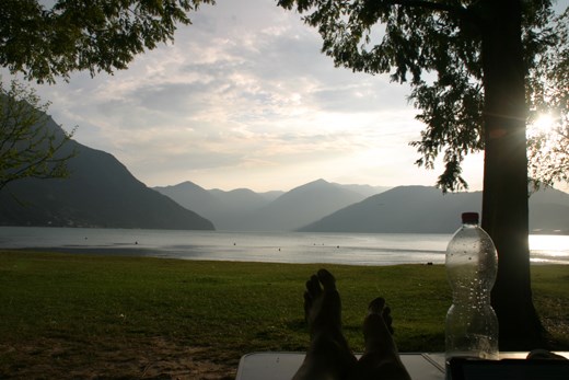 The view from our pitch on the campsite to Lake Iseo (those are Rachel's feet)