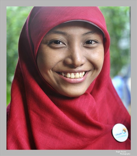 An Indonesian girl displaying her beautiful smile.