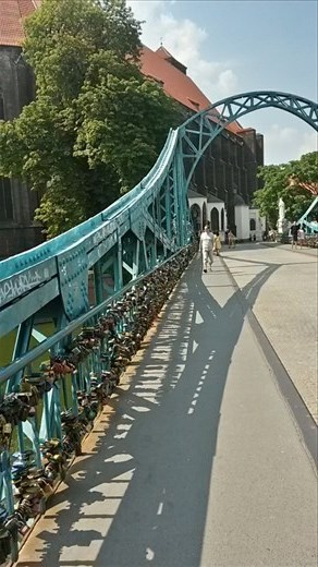 Locked love on a bridge next to old town.  Very soon to be removed and refurbished because of the extra weight