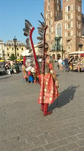 Angel walking through the square