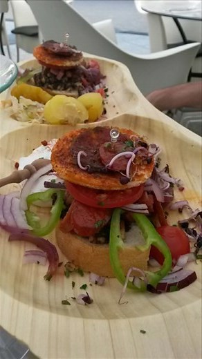 Delicious breakfast sandwich - can't remember everything that was on it e cause there was a lot of stuff but tomato, peppers, onion, sausage, thick pepperoni and a sour cream dipping sauce....mmmm