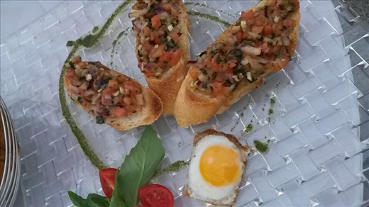 Bruschetta with a quail egg. Very tasty indeed
