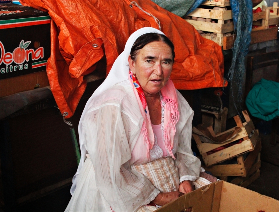 70 years old woman selling fruits and vegetables for whole life..She said to me She must fight for every customer who passes. After all, as everyone there. I felt sorry for her after I saw the sadness in her eyes. She told me different stories of wartime about how her children tried to run away, but some did not survive .. Not many people speak English, they never nedeed. Their language called Serbo-Croatian  which is is relatively easy for the Slavic nations..