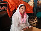 70 years old woman selling fruits and vegetables for whole life..She said to me She must fight for every customer who passes. After all, as everyone there. I felt sorry for her after I saw the sadness in her eyes. She told me different stories of wartime about how her children tried to run away, but some did not survive .. Not many people speak English, they never nedeed. Their language called Serbo-Croatian  which is is relatively easy for the Slavic nations..: by rainbowoneachside, Views[1760]