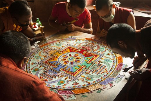 Training the mind to focus and concentrate is an individual affair. They walk together on their journey towards the universal truth through the contours of mind just like they together create the continents, oceans and mountains on this mandala; but the path taken by each is unique and different, filled by the shades and hues of different struggles and experiences.