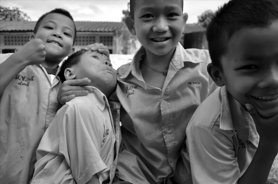 The burmese refugeee children at school all wanting to pose for the camera!