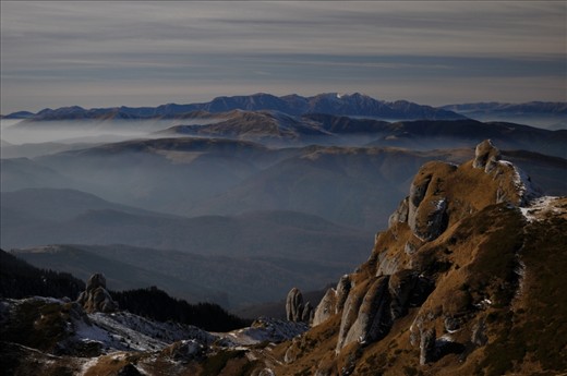 Rising so far above the surrounding forested hills the very tops of the Ciucas mountains offer some of the best views in the area. In the distance we can easily see the Bucegi Mountains.
