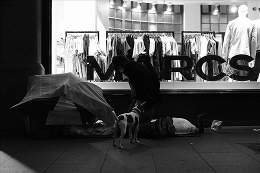 “This is home, the biggest house in town”. A place against the store fronts under the canopy of the Queen Victoria Building, an ornate late nineteenth-century shopping complex, which fills an entire city block. Warren finishes his day around 11pm and comes here, unpacks his suitcase and makes his bed from an old foldable bed pad and few layers of threadbare blankets. He empty’s his pockets and tally’s up his earnings for the day. He takes Bronx and Gypsy for one last walk around the block before they all bed down for the night. “God put me on the street for a reason”.
