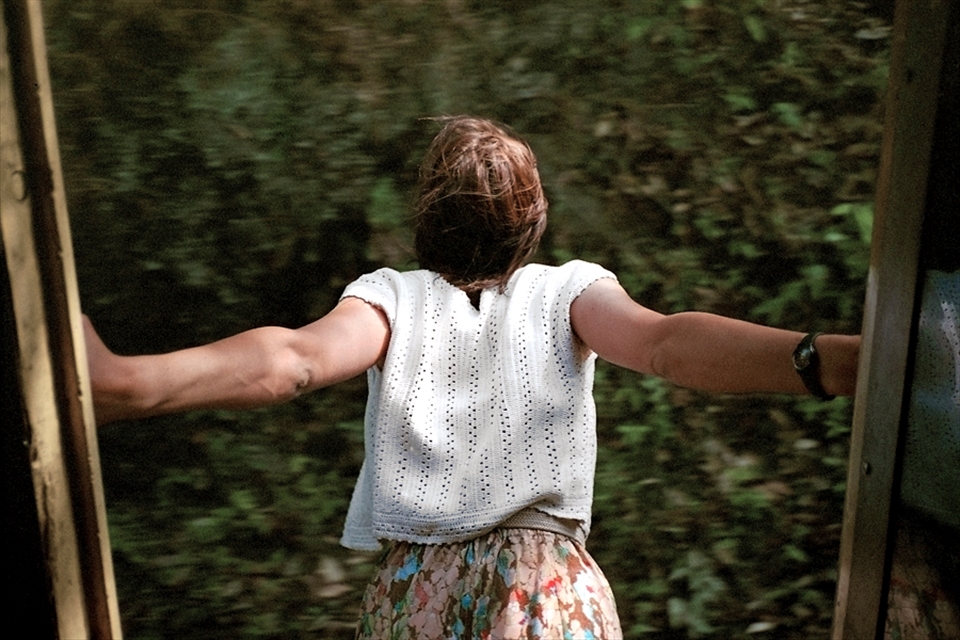 There seem to be no rules on trains here. Warm beer. Monkeys. Feet dangling.