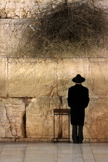 Faces of the Middle East - Prayer.
With prayers written on paper and stuffed into every tiny crevice of the Western Wall, the flow of water behind the wall giving life to its many plantations that sprout randomly along its face, thousands gather daily and unite in prayer. This is a place of life and growth, a place of hope.