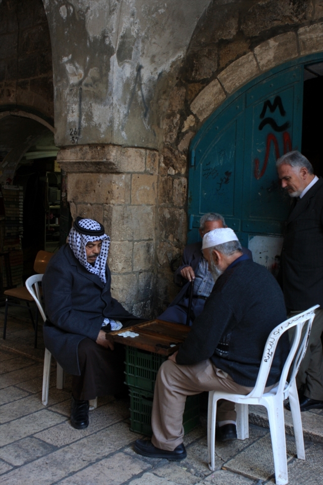 Faces of the Middle East - Friendship.
Local Palestinian men spend their lazy Sunday afternoon playing a game of Backgammon.