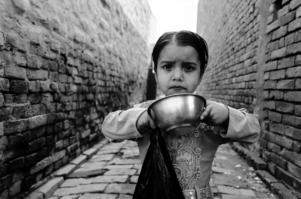 I meet this curious girl on the street of this beautiful village in Uttar Pradesh. she was very curious to see what I was carring in my hand. The camera. She was very captivating and innocent. 