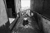 Lunch. A household waits for rice to cook over a coal-fired clay pot. : by raule, Views[642]