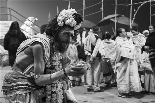 Meet Dhananjay, one among the hundreds of sadhus at Varanasi. Hunchbacked and crippled, he roams the ghats or cremation sites begging for alms from the thousands who come to the holy city to see off their near ones to another world. Hindus believe that giving alms to sadhus brings salvation to the soul.