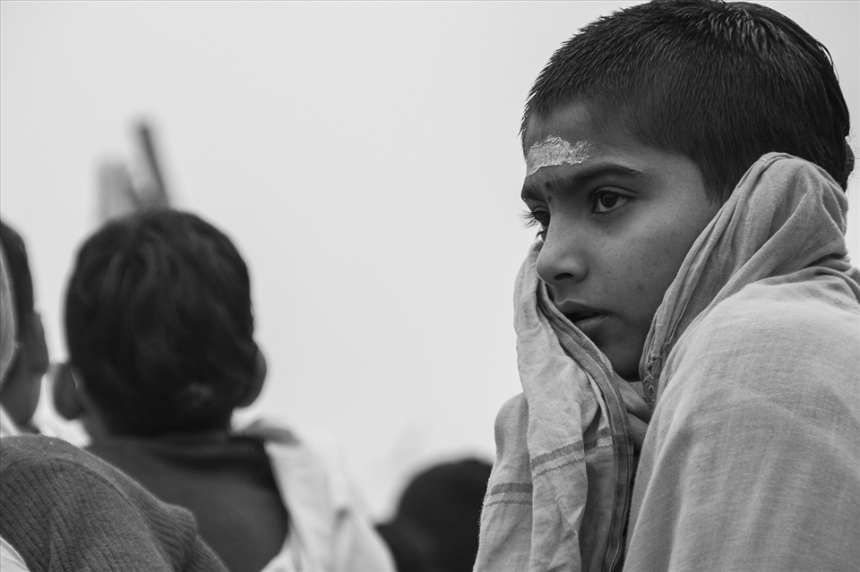 I saw this young Brahman boy lost in his thoughts, while his classmates chanted slogans sitting on the banks of the Ganga. Many Brahman families send off their boys to gurukuls, schools like these that train priests, at a tender age. An age when they should be playing and making the most of their childhood.
