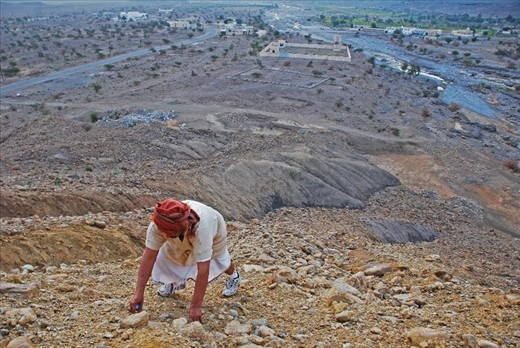 This is of my father, Sultan, climbing a mountain in the village of Tawiyah. He didn't grow up here, but in a village near by, Al Kamil. My father has family in Tawiyah so we spend time there when I visit Oman. My father grew up selling, harvesting, picking, and selling dates to pay his way to attend school in Saudi Arabia. Like this photo, my father literally climbed his way up from the village ruins to achieve where he is now; a husband, father of six, professor, and the strongest man I know. 