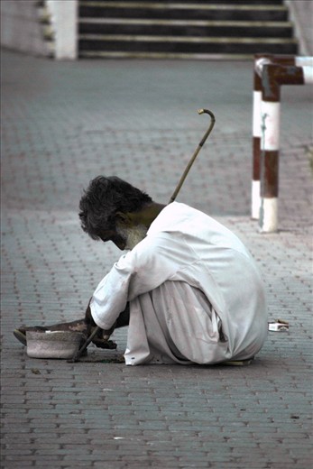 As I was walking down the streets of Muttrah, a port city in Oman, I spotted far in the distance a old man experiencing homelessness. He seems to have three possessions, his cane, hat, and prayer beads. My father then pulled a few Rials from his pocket and handed it to my little sisters to put in his hat when we passed by. 