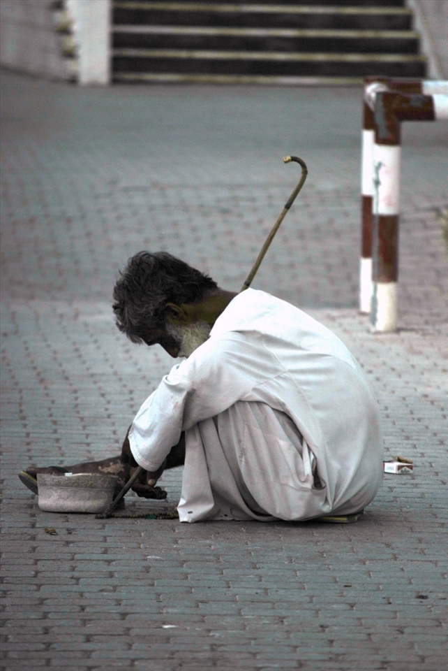 As I was walking down the streets of Muttrah, a port city in Oman, I spotted far in the distance a old man experiencing homelessness. He seems to have three possessions, his cane, hat, and prayer beads. My father then pulled a few Rials from his pocket and handed it to my little sisters to put in his hat when we passed by. 